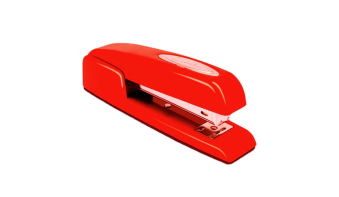 Red stapler isolated on a white bachground