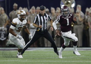 Texas A&M Aggies quarterback Kyler Murray (1) runs the ball against Arizona State Sun Devils defensive back Lloyd Carrington (8) during the first half of a college football game during the Advocare Texas Kickoff game at NRG Stadium on Saturday, Sept. 5, 2015. ( Karen Warren / Houston Chronicle )