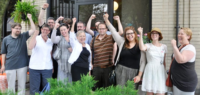 Adjuncts with fists in the air
