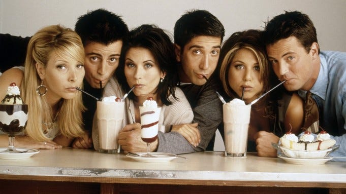 photo of the cast of friends drinking milkshakes and looking deceptively cute