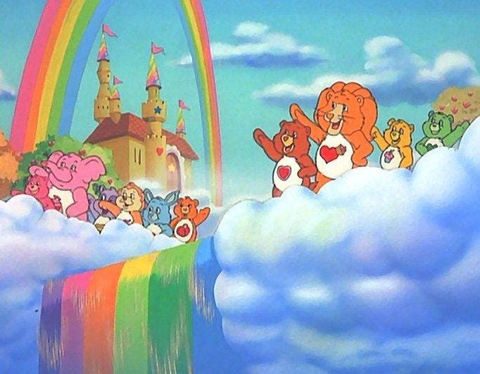 The Kingdom of Caring, full of rainbow rivers and regular rainbows in the sky, sitting atop a mountain of clouds. A castle is in the background, and the various Care Bear characters are grouped together waving.