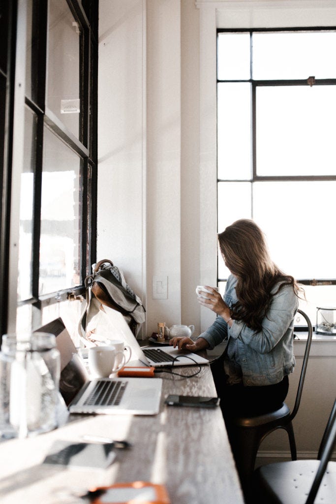 girl-working-on-laptop-at-desk