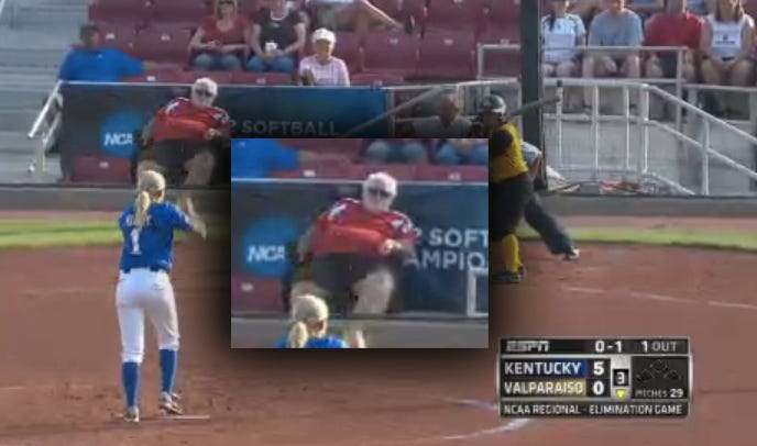 Big Dude Sitting Front Row At College Softball Championship
