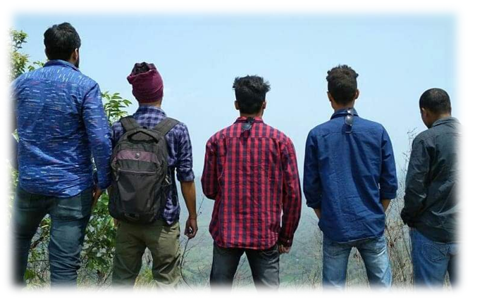 The author’s friends looking over a hill together.