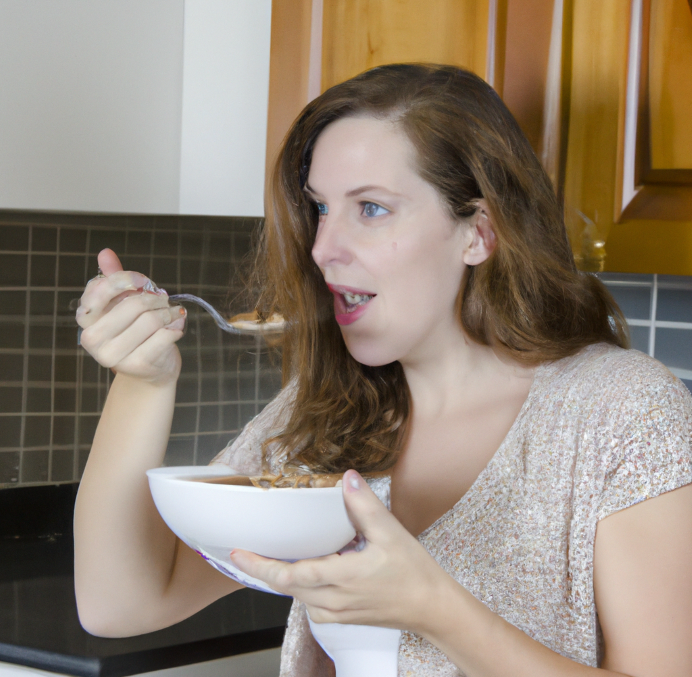 woman eating bowl of oats
