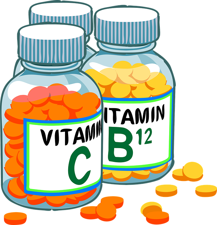 Cartoon picture of a bottle of vitamin C and a bottle of vitamin B12.
