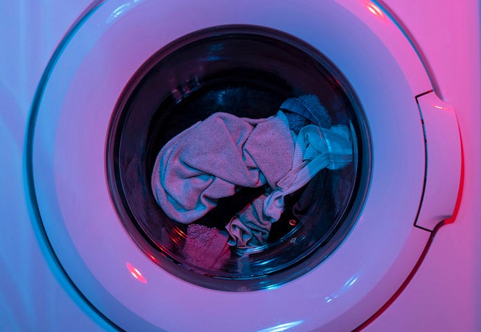 Front-loading washing machine designed to wash clothes.