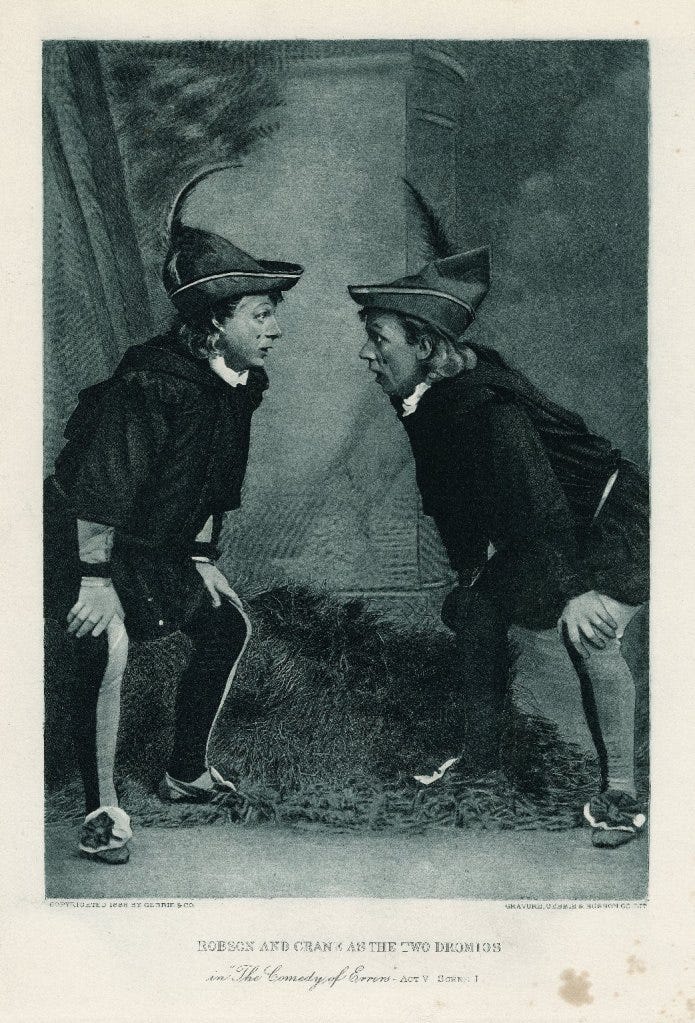 Two Dromios in Robin Hood hats look at each other with their hands on their knees