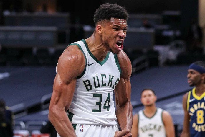 Giannis Antetokuonmpo flexing against the Indiana Pacers