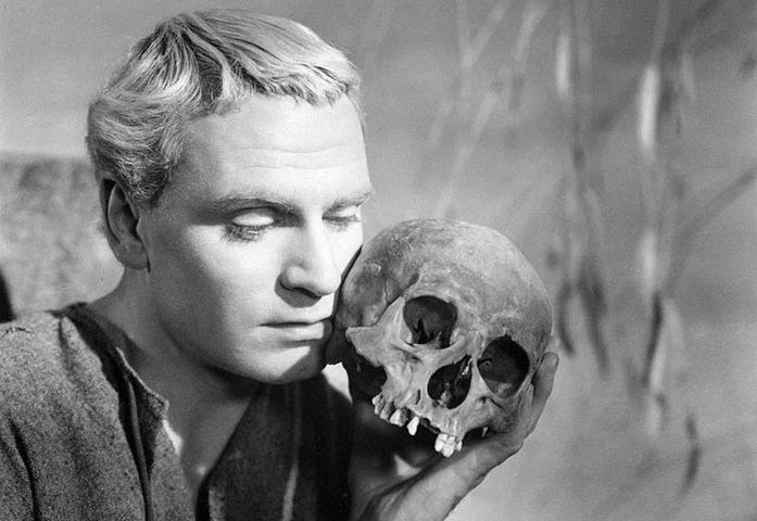 Lawrence Olivier getting some snuggle time with Yorick, a fellow of infinite jest