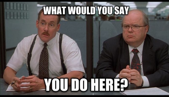 Scene from Office Space of two white men asking, What would you say you do here?