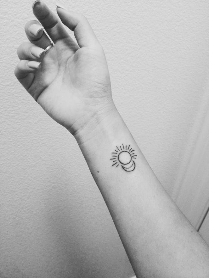 Tiny moon and sun tattoo on the right wrist - Tattoogrid.net - tiny moon and sun tattoobr /
