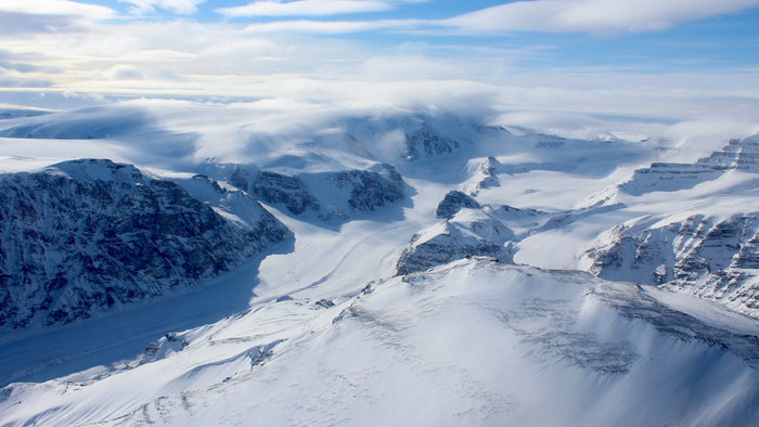 Ice capped and snow-covered mountains of coastal west Greenland (April 2015). Image credit: Matthew Osman, Woods Hole Oceanographic Institution.