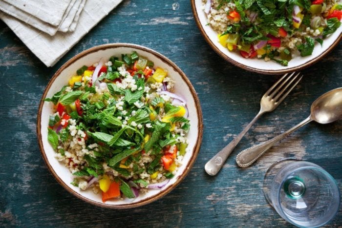 Plates of refreshing bulgur and vegetables salad