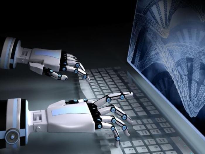 Robot hands typing on a computer