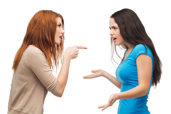 Woman arguing with another Woman.