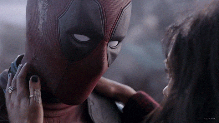 Vanessa from Deadpool removing Deadpool’s mask to reveal a bad cutout of Hugh Jackman’s face