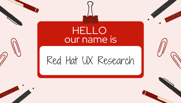 A name tag surrounded by pens, pencils, and paper clips. It reads, “Hello, our name is Red Hat UX Research.”