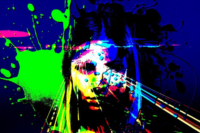 Abstract face of a woman with paint splashes