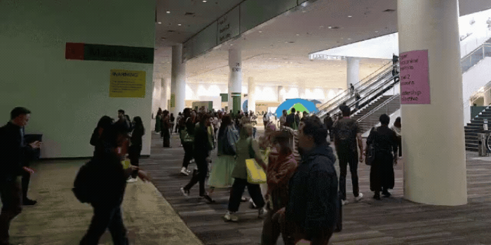 A diverse group of people walking around Config 2024 at Moscone Center South in San Francisco, CA.