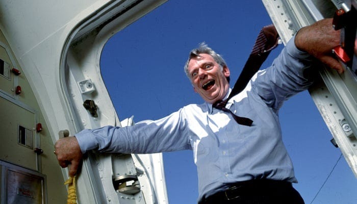 Herb Kelleher at the door of an airplane
