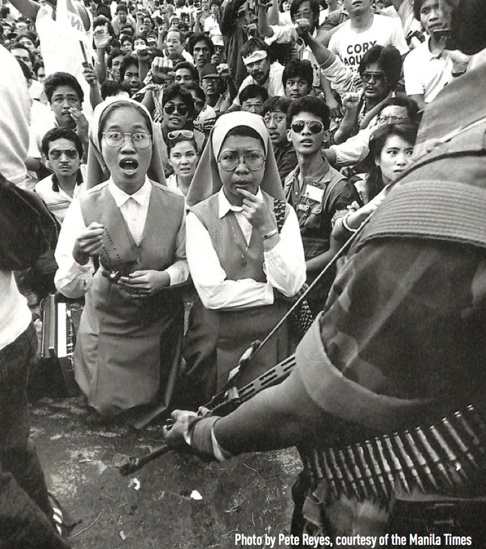 2 Filipina Nuns in prayer and protest during the Edsa Revolution