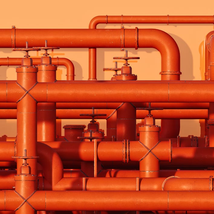 Image of many orange interconnected pipes
