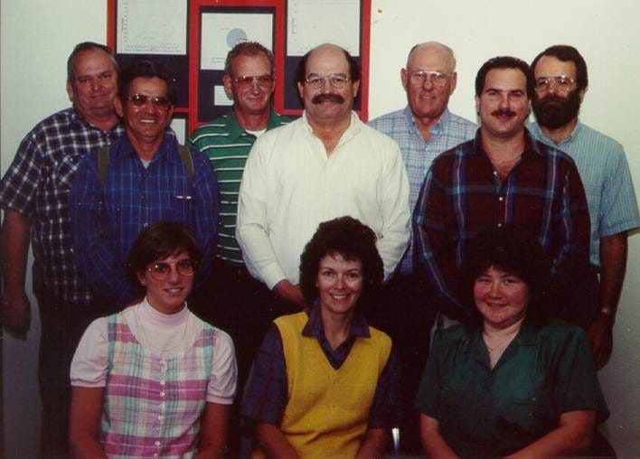 Group photo of Mary and other staff at her job with the USFWS at the Ashland, WI Field Station.