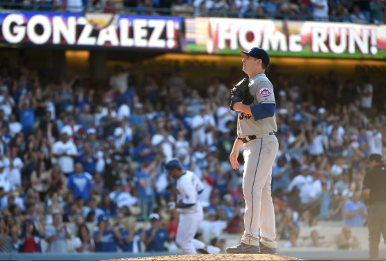 Matt Harvey reacts to a solo home run by Adrian Gonzalez at Dodger Stadium on July 4. (Photo by Harry How/Getty Images)