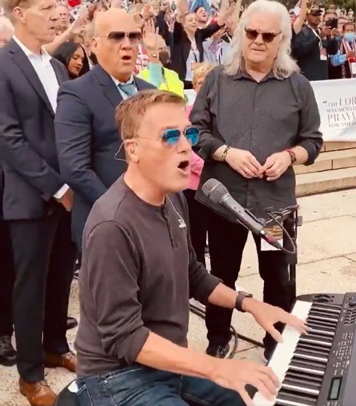 Michael W Smith singing at a Franklin Graham event