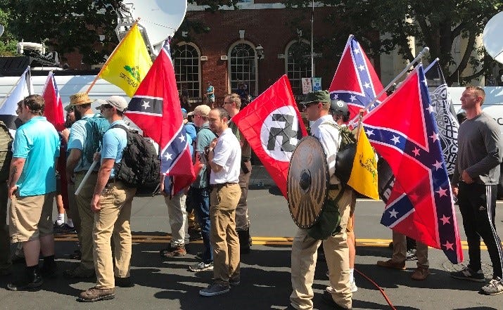 By Anthony Crider; cropped by Beyond My Ken (talk) 20:37, 9 April 2018 (UTC) — Charlottesville “Unite the Right” Rally, CC BY 2.0, https://commons.wikimedia.org/w/index.php?curid=68193094