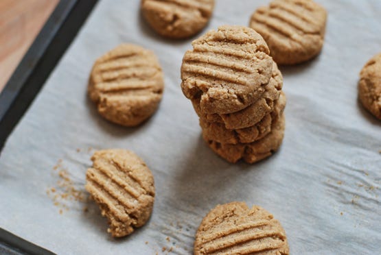 Stacked Natural Peanut Butter Cookies with Partially Eaten Cookie