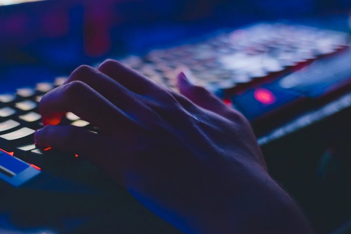 Woman typing on a keyboard