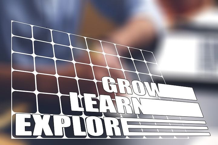 A graphics showing text ‘Grow’, ‘Learn’ and ‘Explore’.