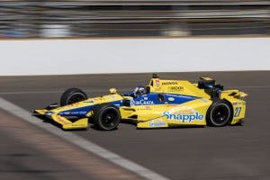Marco Andretti, driver of the No. 27 Snapple Honda, crosses the famous Yard of Bricks at the Indianapolis Motor Speedway.