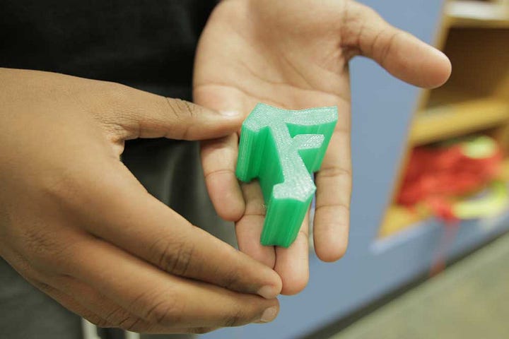 A student-designed "F" in graffiti style that was rendered in 3D and printed using a 3D printer at this year's RHAPSODY Hip-Hop Summer Arts Camp.