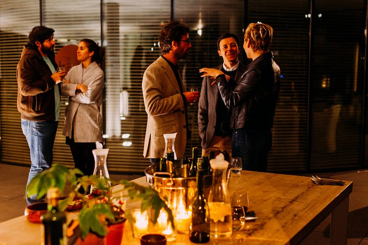 Five people in casual office setting