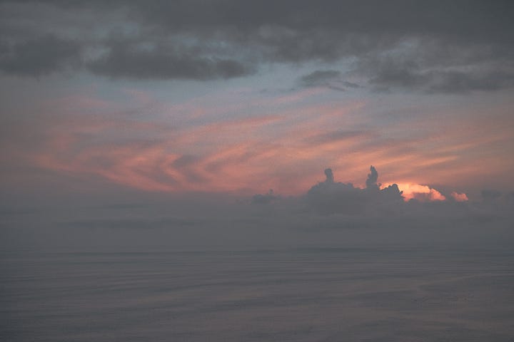 blazingly beautiful sunset in a cloudy sky over the sea