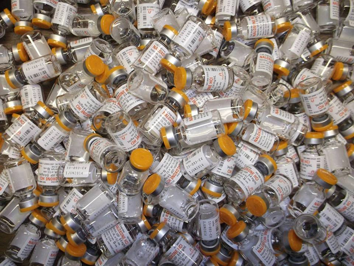 close up photo of hundreds of naloxone vials