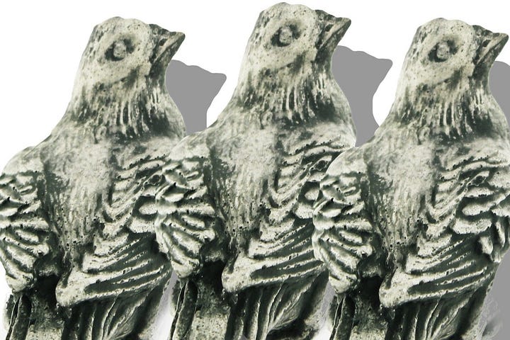 Series of three white and black resin lark figurines shaded in gray on a white backdrop.