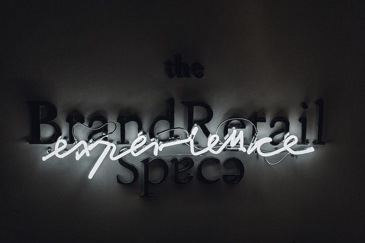 The picture says in cool lettering: the brand retail experience space