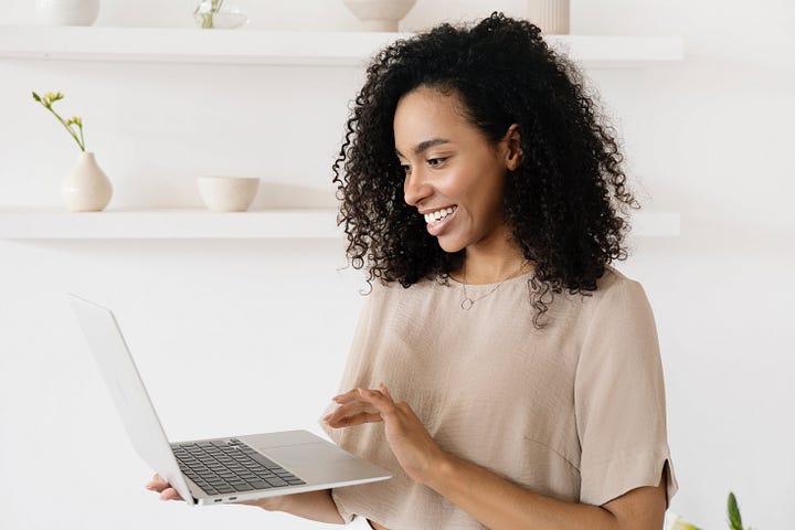 A Woman using a Laptop