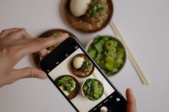 Taking a photo of a meal for instagram