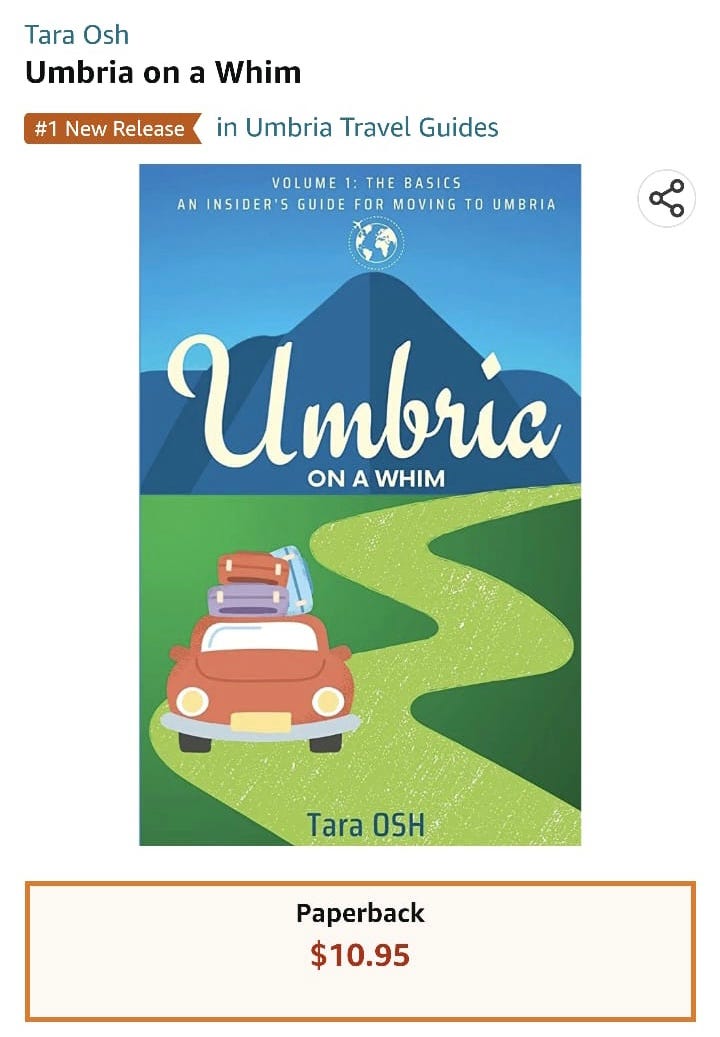 Book cover for Umbria on a Whim with a cartoon car driving down a road towards a mountain.