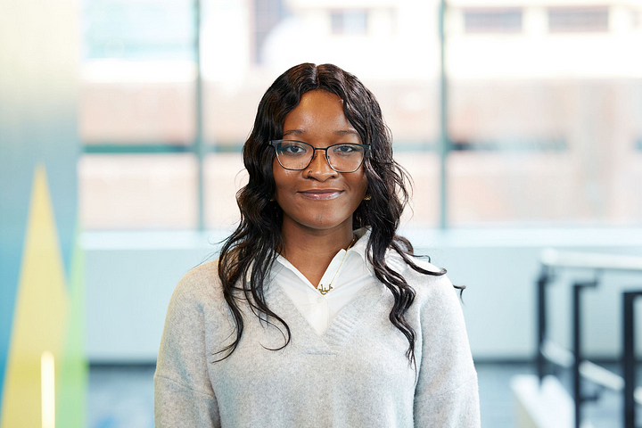 Waliyat Afolabi smiles at the camera.