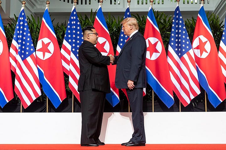 Trump shaking hands with Kim jong un North Korea