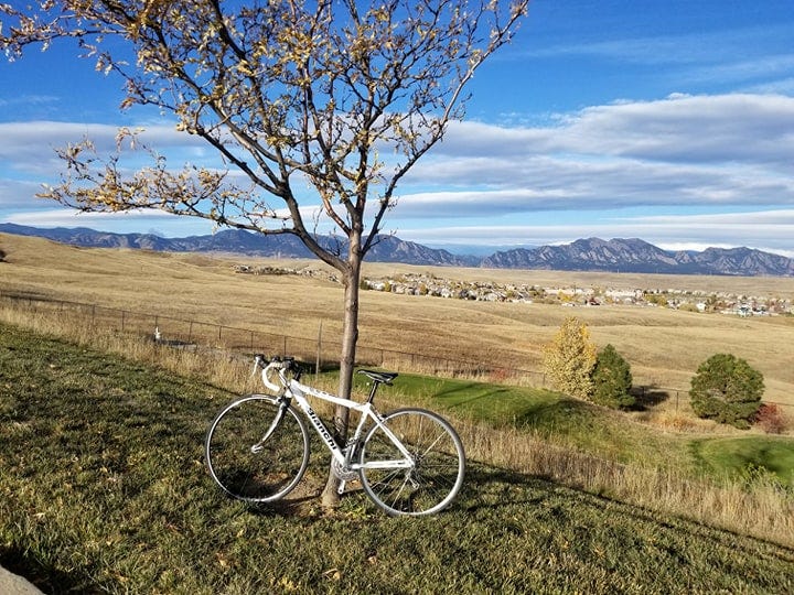 Bianchi road bike against the backdrop of the mountains, Front Range, Colorado