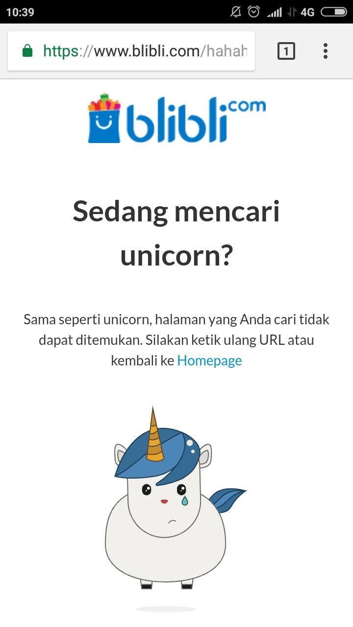 Ini adalah gambar error message ketika halaman yang dicari tidak ketemu. Headline bertuliskan Sedang mencari unicorn? Sub-headline di bawah headline bertuliskan Sama seperti unicorn, halaman yang Anda cari tidak dapat ditemukan. Silakan ketik ulang URL atau kembali ke homepage. Di bawahnya lagi ada ilustrasi seekor unicorn yang sedang menitikkan air mata.
