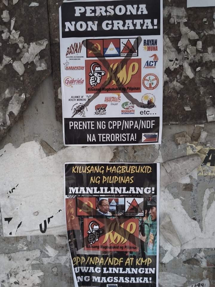 Posters in Manila accusing KMP of being a terrorist front and deceiving peasants.