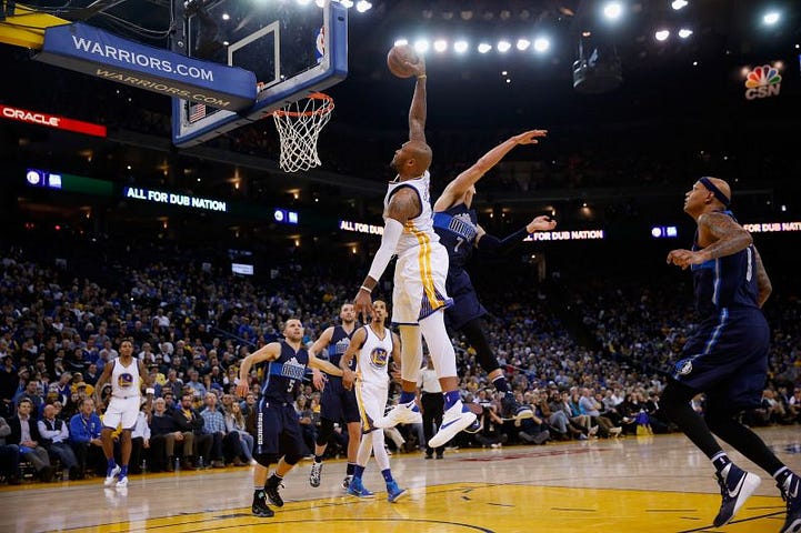 Marreese_Speights_of_the_Golden_State_Warriors_skies_for_a_dunk_attempt_against_the_Dallas_Maver_20993_11842